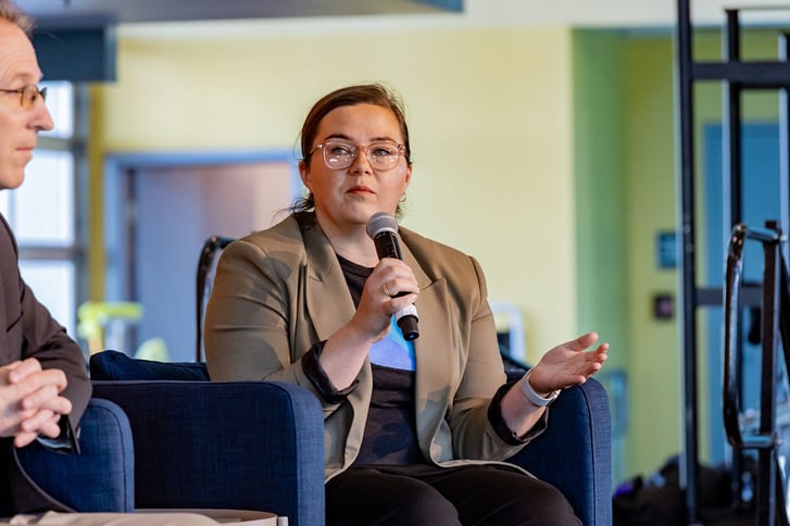 Beth Holmes speaking on a panel at Hint Summit 23